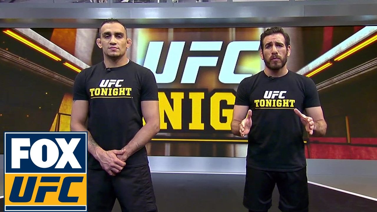 Tony Ferguson demonstrates a D’Arce choke with Kenny