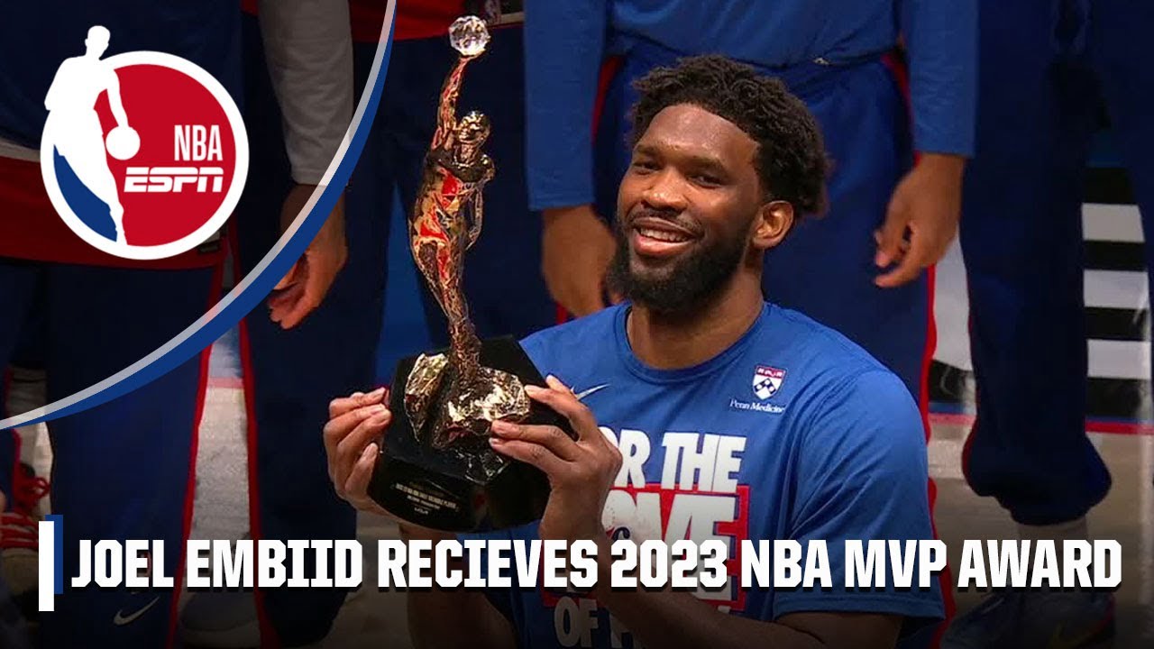 Joel Embiid lifts 2023 NBA MVP trophy with Adam Silver and family ????